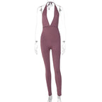 Elegant Jersey Jumpsuit with Deep Neckline and Tie Straps
