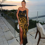 Elegant Sleeveless Maxi Dress with Asymmetrical Cut and Animal Print