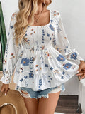 Women's Blouse with Floral Patterns and Voluminous Sleeves
