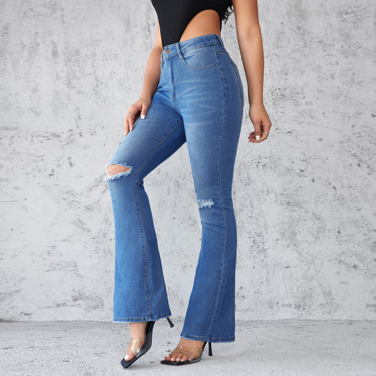 Women's Flared Jeans with Distressed Details