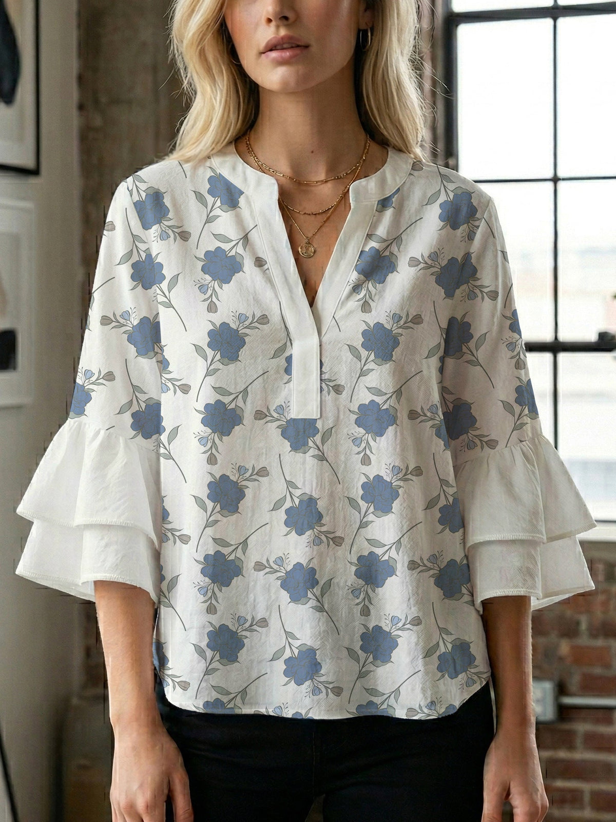 Women's Blouse with Voluminous Sleeves and Floral Design
