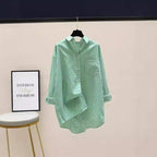 Women's Striped Oversized Shirt with Longer Back and Practical Chest Pocket