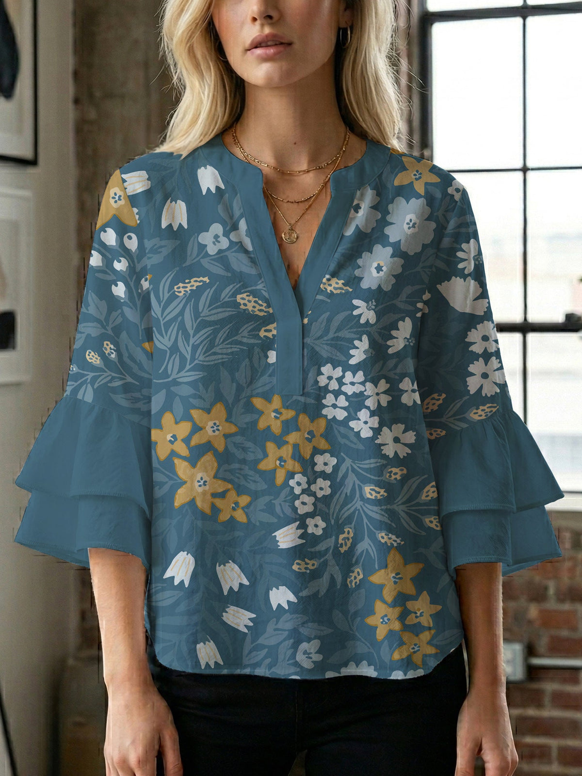 Women's Blouse with Voluminous Sleeves and Floral Design