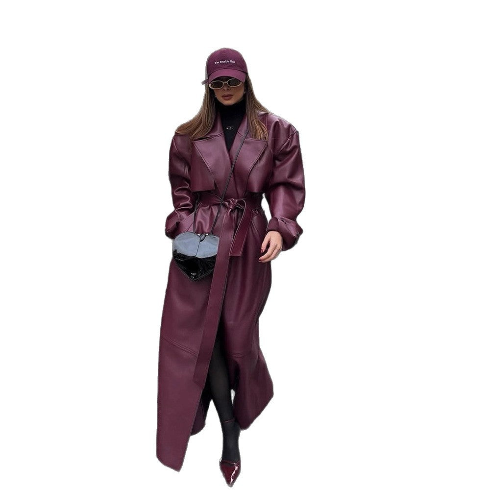 Elegant Faux Leather Jacket with Voluminous Sleeves and Waist Belt