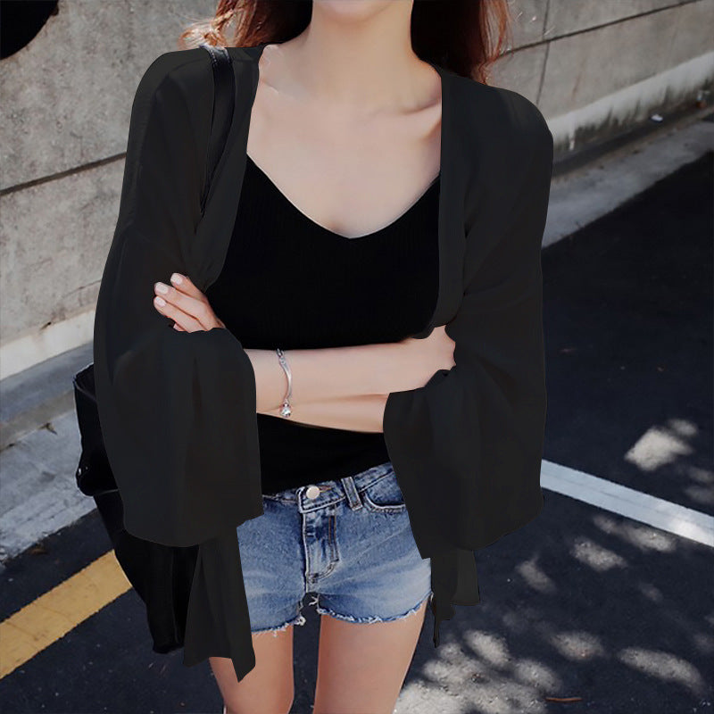 Elegant Kimono Jacket with Loose Fit and Detailed Sleeves