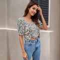 Women's Blouse with Floral Design and Ruched Detail
