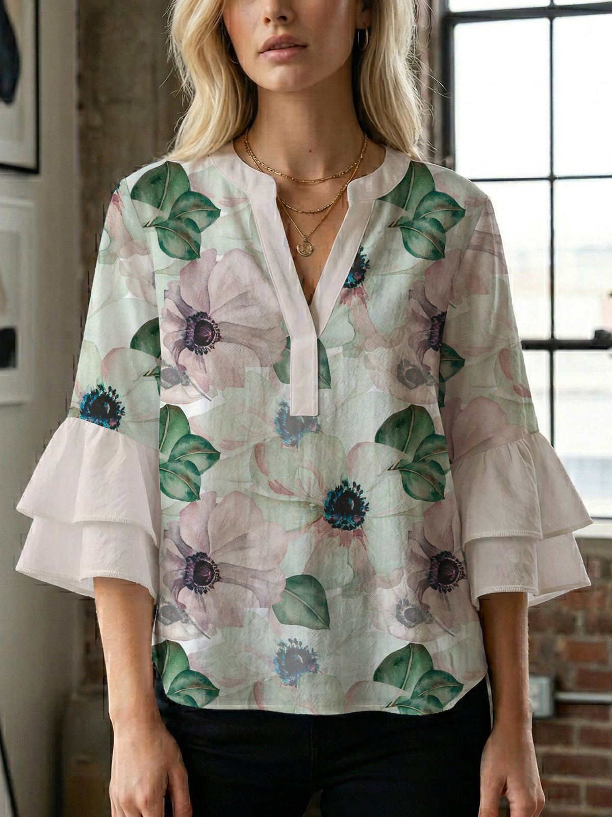 Women's Blouse with Voluminous Sleeves and Floral Design