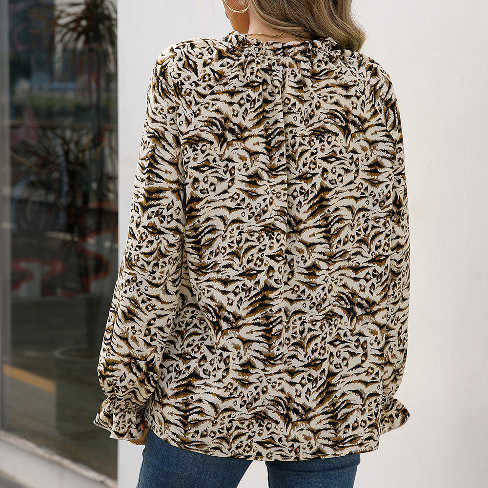 Women's Blouse with Unique Animal Print and Ruffle Details