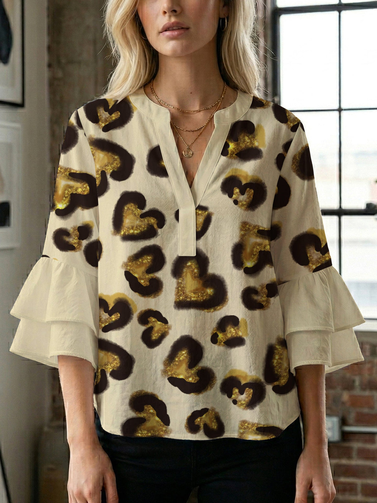 Women's Blouse with Voluminous Ruffle Sleeves and Modern Print