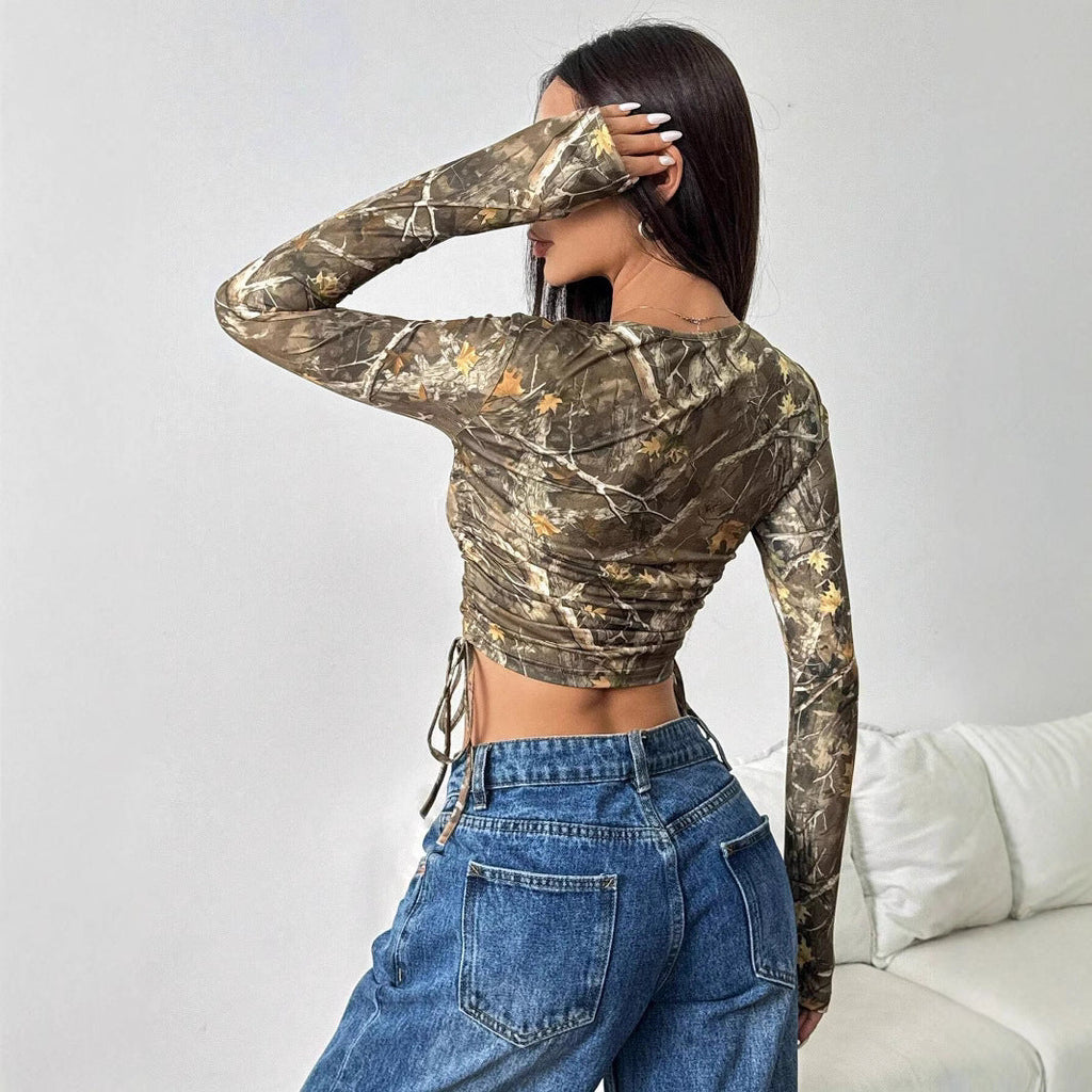 Women's Form-Fitting Long Sleeve Shirt with Ruching and Camouflage Design