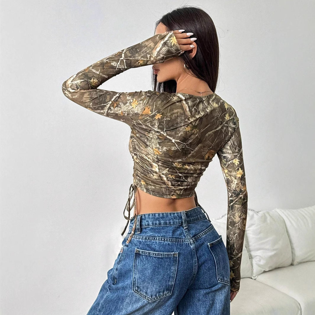 Women's Form-Fitting Long Sleeve Shirt with Ruching and Camouflage Design