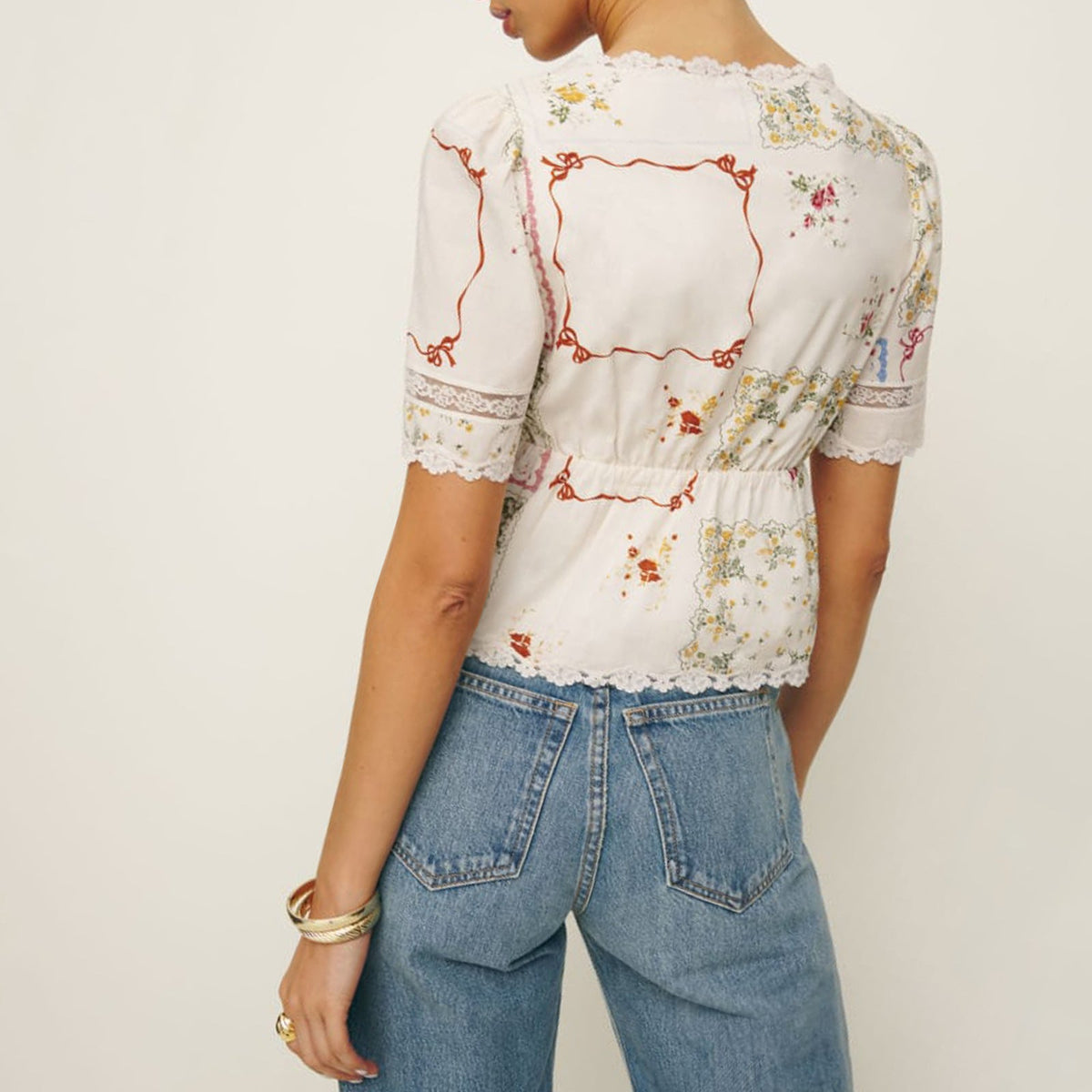 Women's Blouse with Floral Accents and Lace Trim