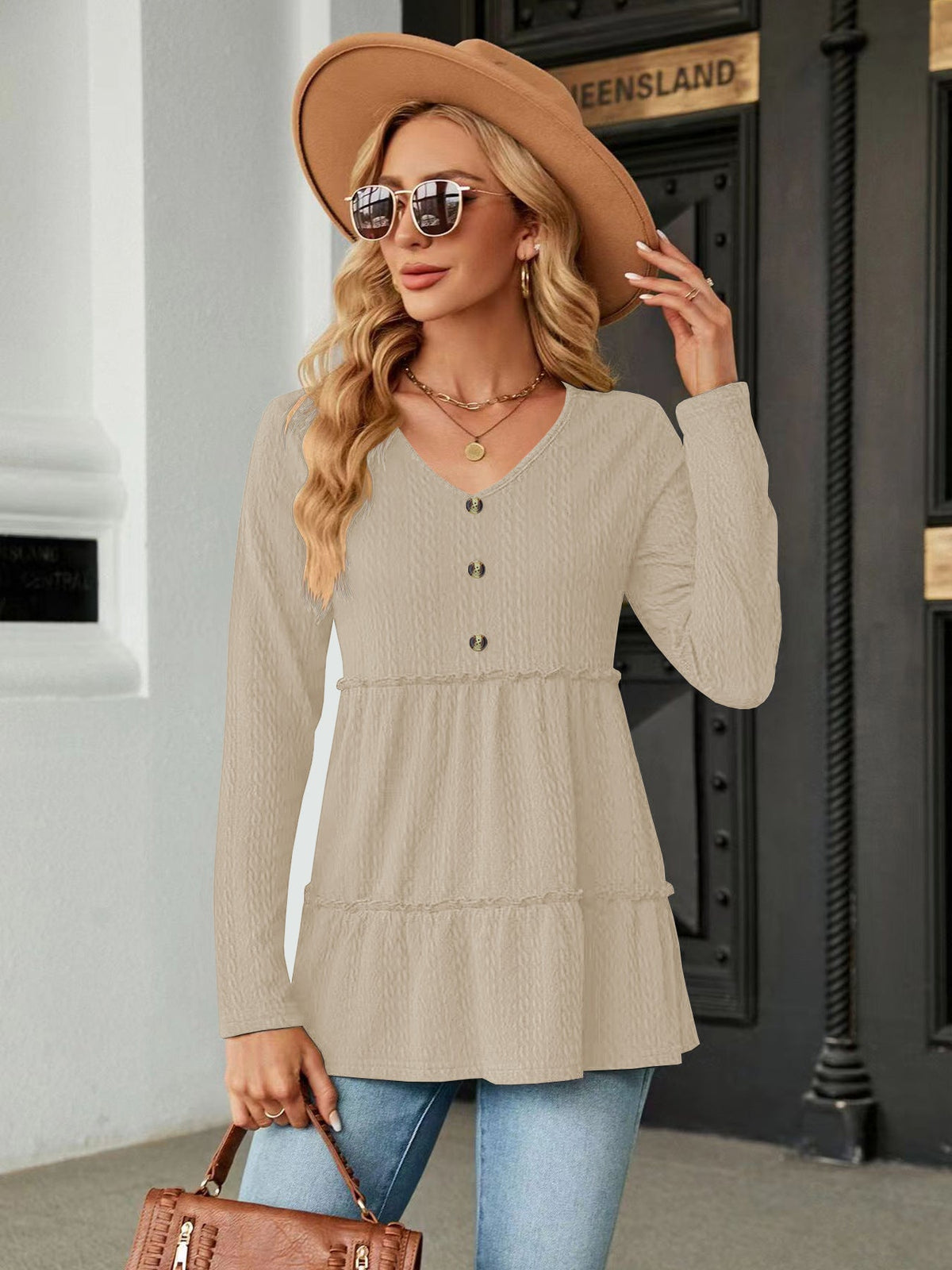 Women's Sleeveless V-Neck Shirt with Button Details and Voluminous Hem