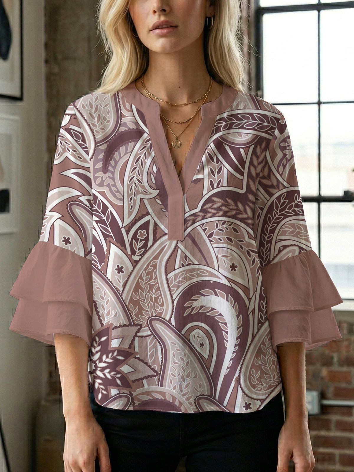 Women's Blouse with Voluminous Ruffle Sleeves and Floral Design