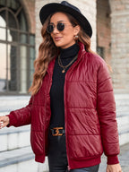 Women's Elegant Quilted Jacket with High Collar and Modern Pockets