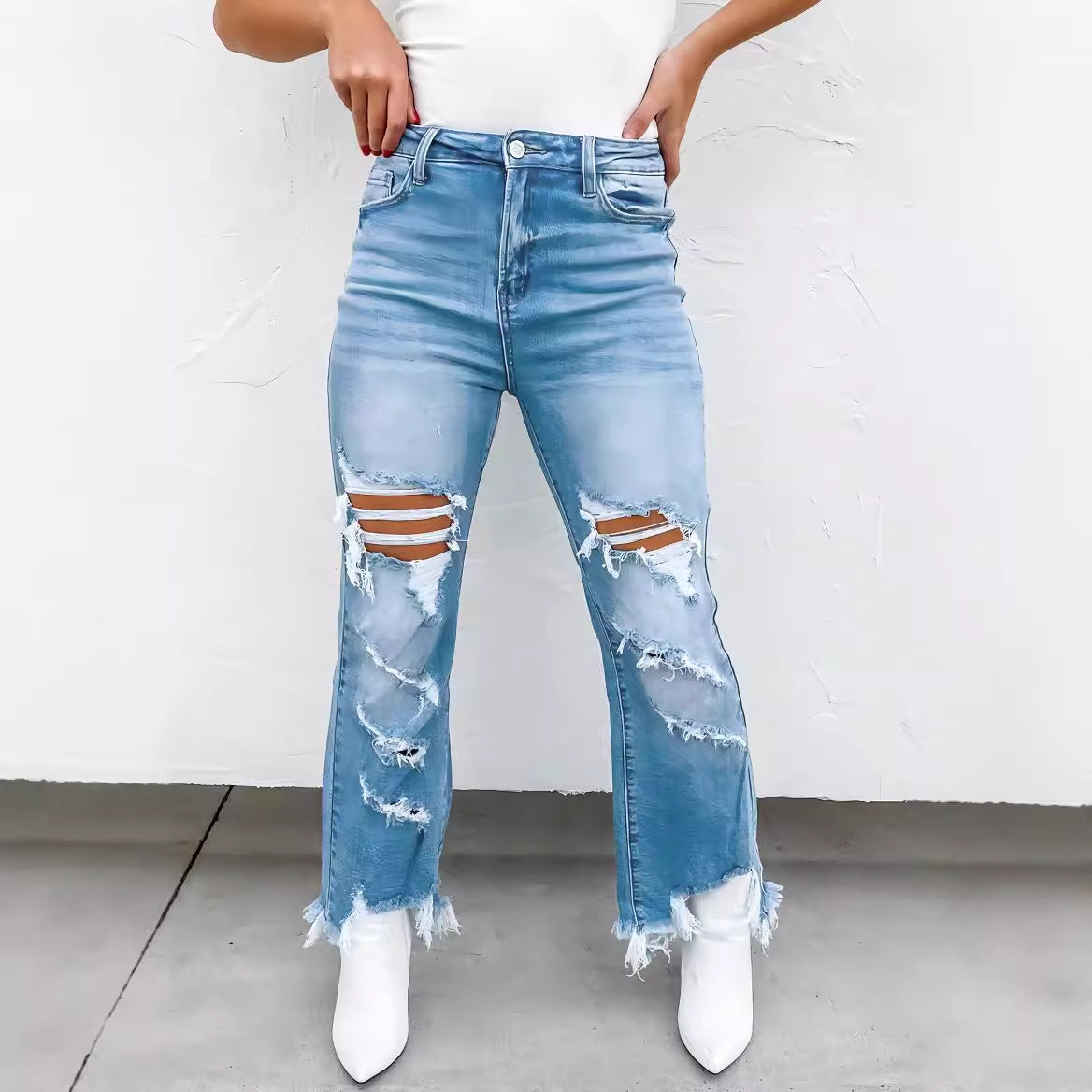 Women's High-Waisted Flared Jeans with Distressed Details