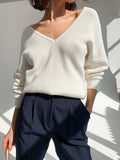 Elegant V-Neck Sweater with Fine Ribbed Texture and Drop Shoulders
