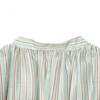Women's Blouse with Deep V-Neck and Ruffle Details