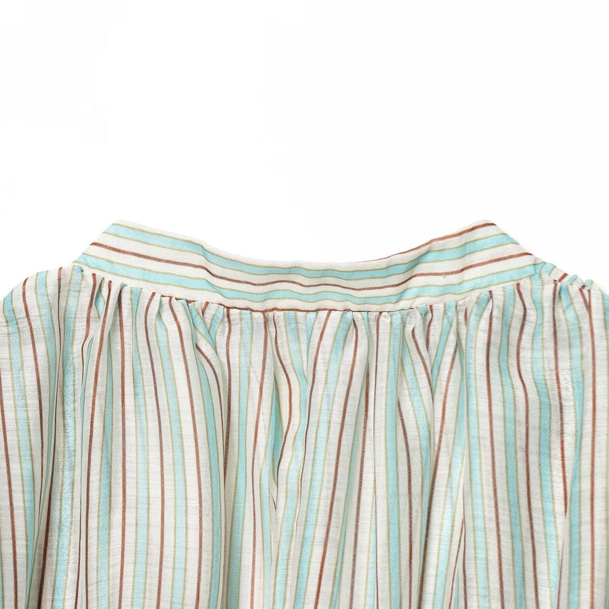Women's Blouse with Deep V-Neck and Ruffle Details