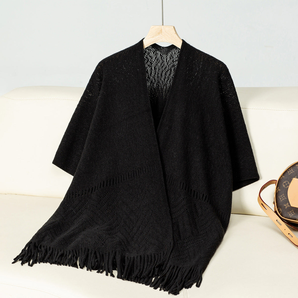 Elegant Knit Poncho with Fringed Details and Pattern