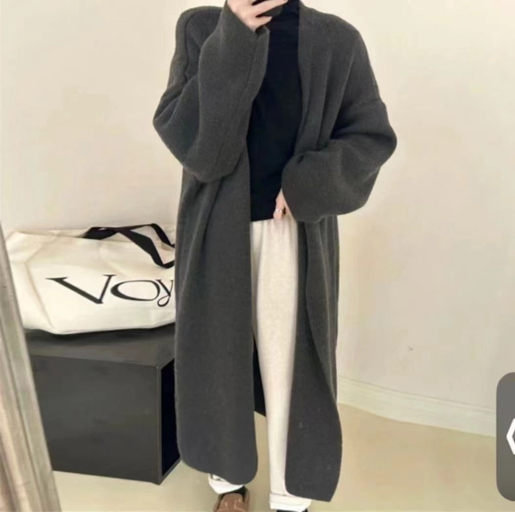 Women's Minimalist Long Wool Coat with Wide Cut and Elegant Details