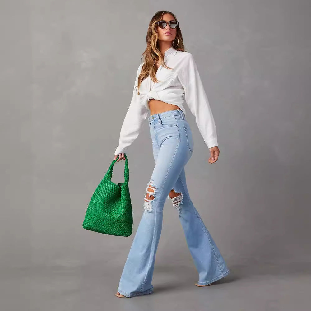 Women's Flared Jeans with Frayed Hem and Washed Effect