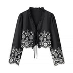 Elegant Blouse with Floral Embroidery and Ruffles