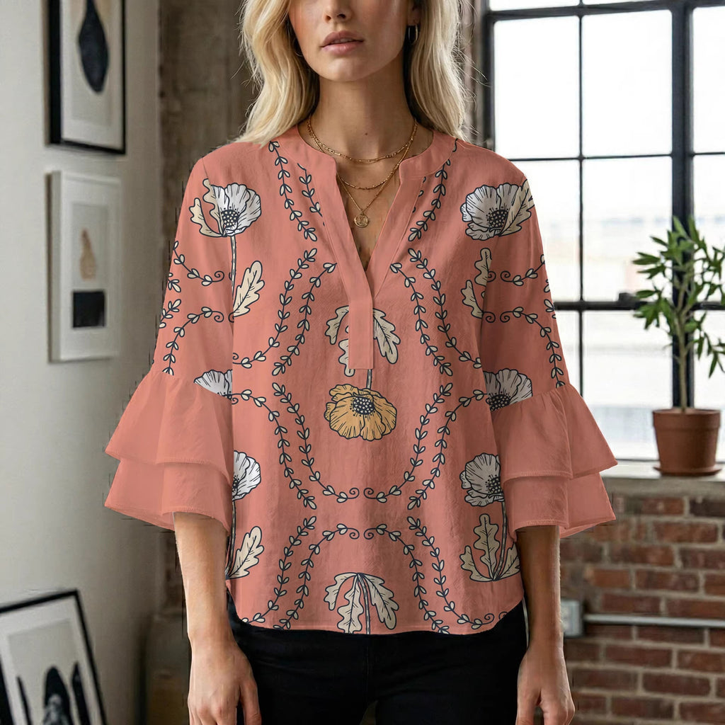 Women's Blouse with Voluminous Ruffle Sleeves and Floral Design