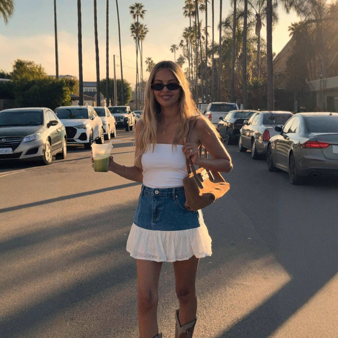 Women's Denim Skirt with Voluminous Ruffled Hem and Floral Detail