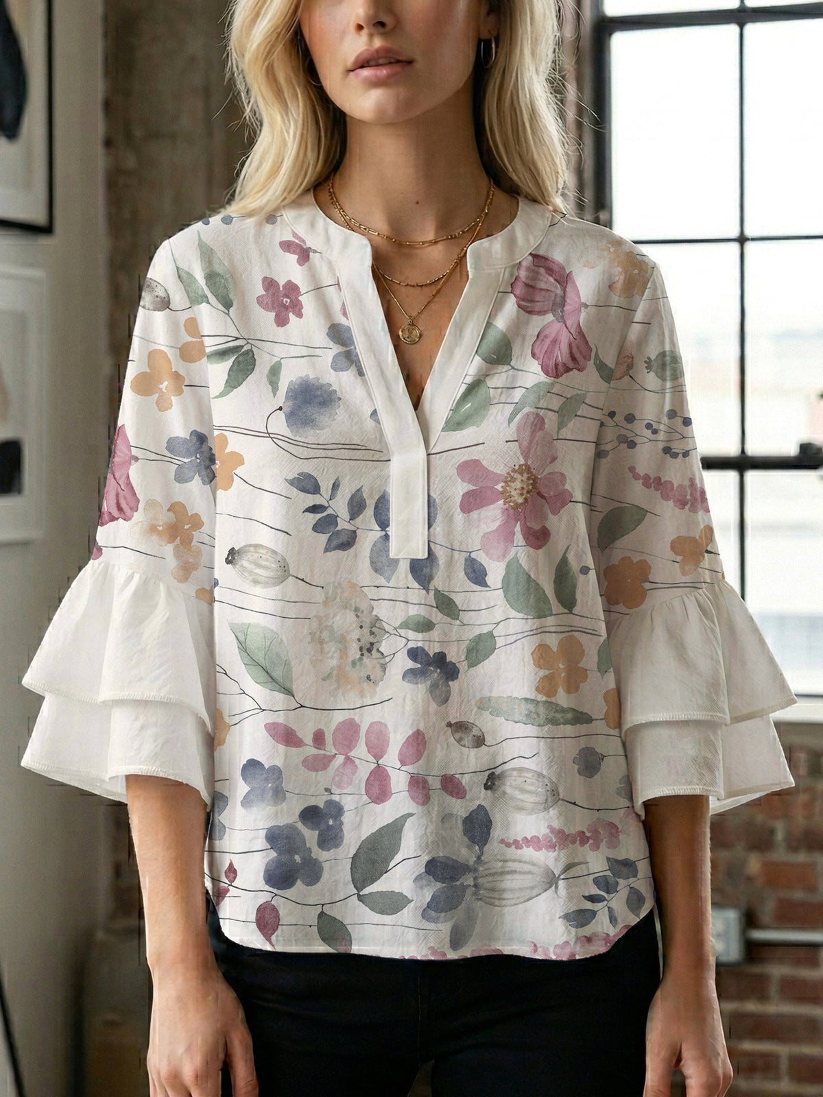 Women's Blouse with Voluminous Sleeves and Floral Design