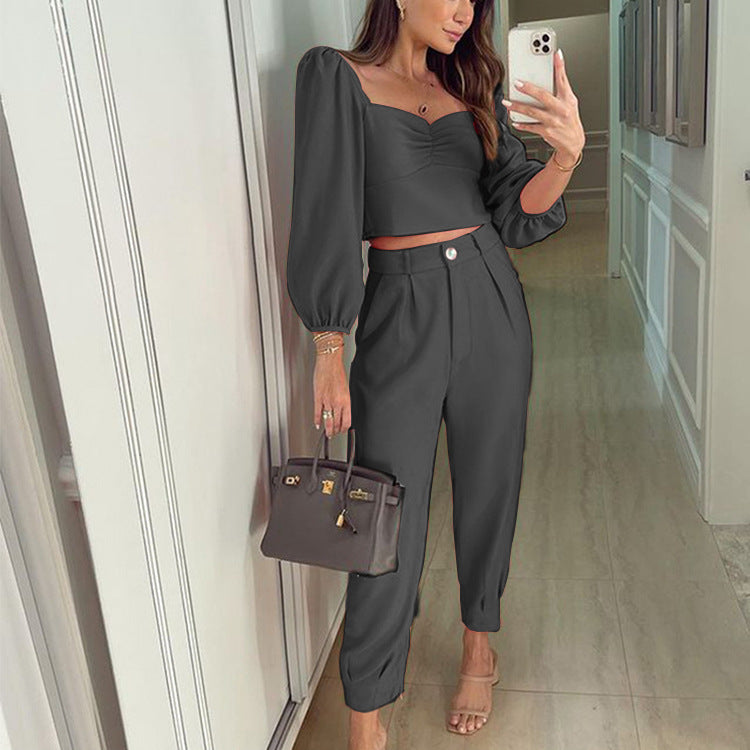 Elegant Women's Cropped Top and High-Waisted Trousers Set