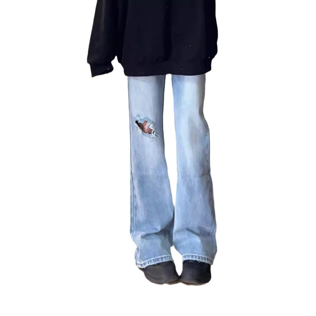Women's High-Waisted Flared Jeans with Distressed Details