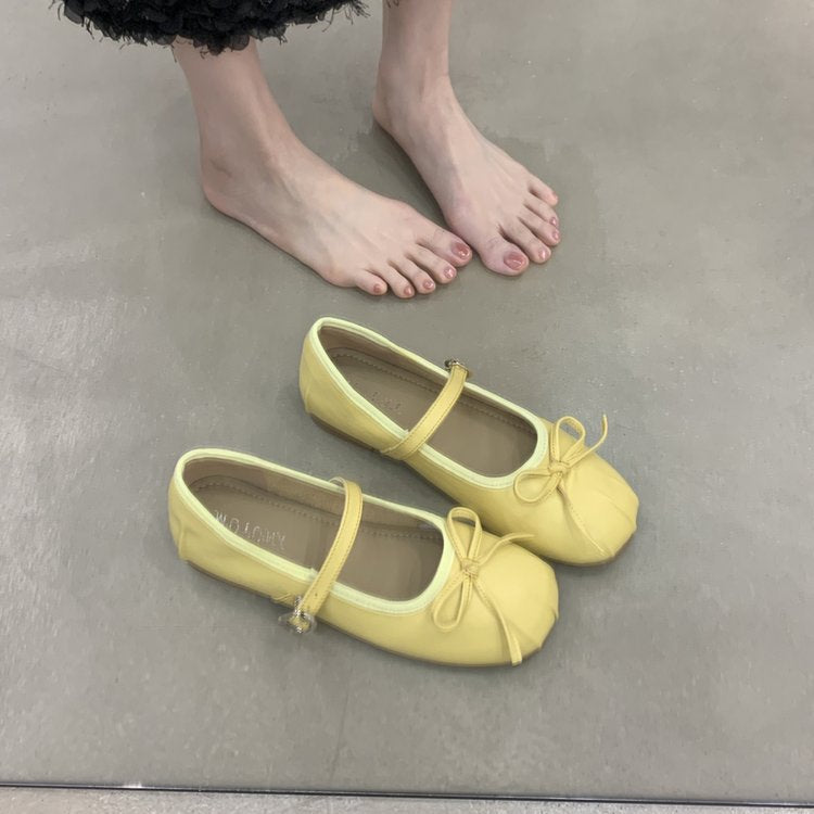 Women's ballet flats with decorative strap and comfortable footbed