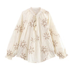 Women's Blouse with Floral Embroidery and Elegant Tassels