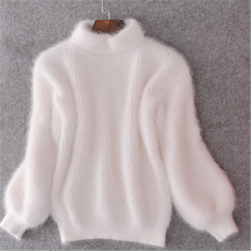 Women's fluffy turtleneck pullover with puff sleeves and textured design