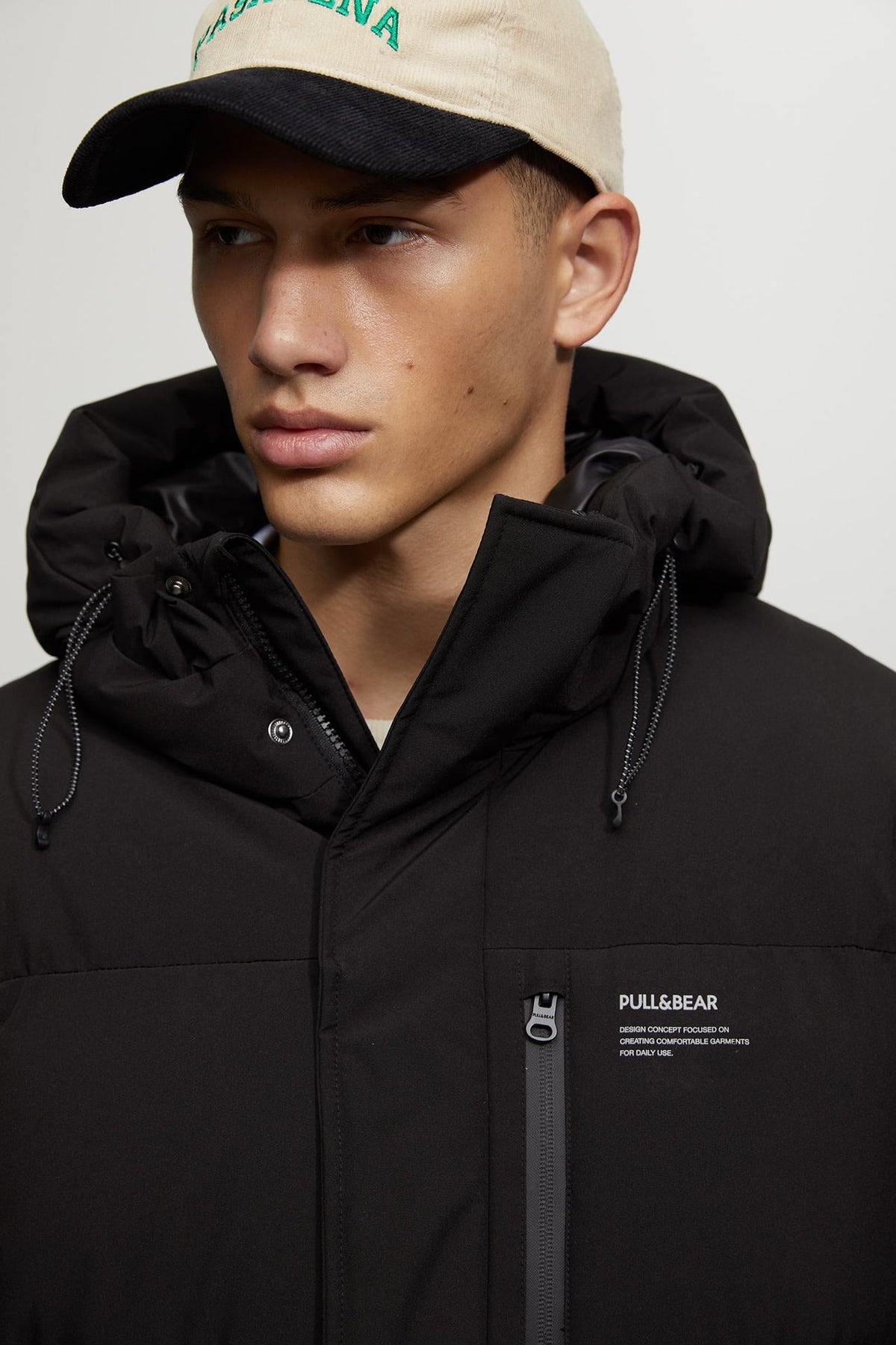 Women's Quilted Winter Coat with Hood and Practical Pockets