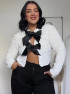 Elegant Jacket with Sequin Trim and Bow Detail