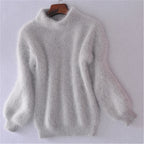 Women's fluffy turtleneck pullover with puff sleeves and textured design