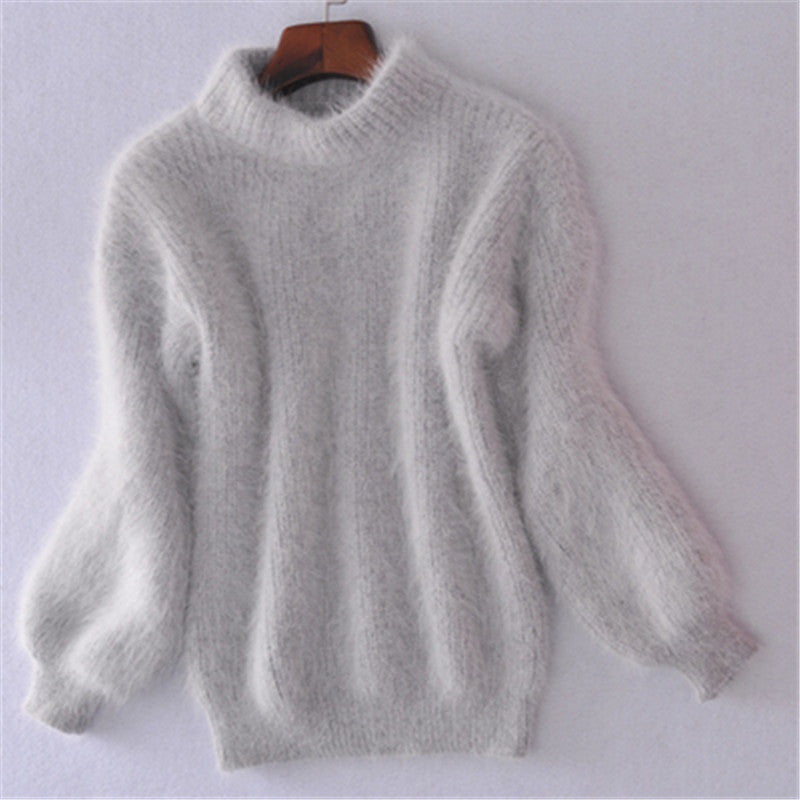 Women's fluffy turtleneck pullover with puff sleeves and textured design