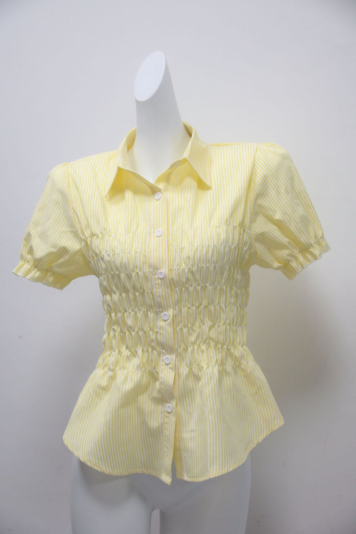 Women's Blouse with Tiered Ruffles and Fitted Cut