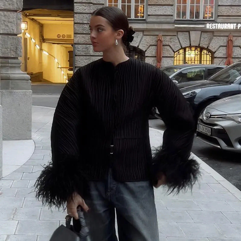 Elegant Quilted Jacket with Ruffle Details and High Collar