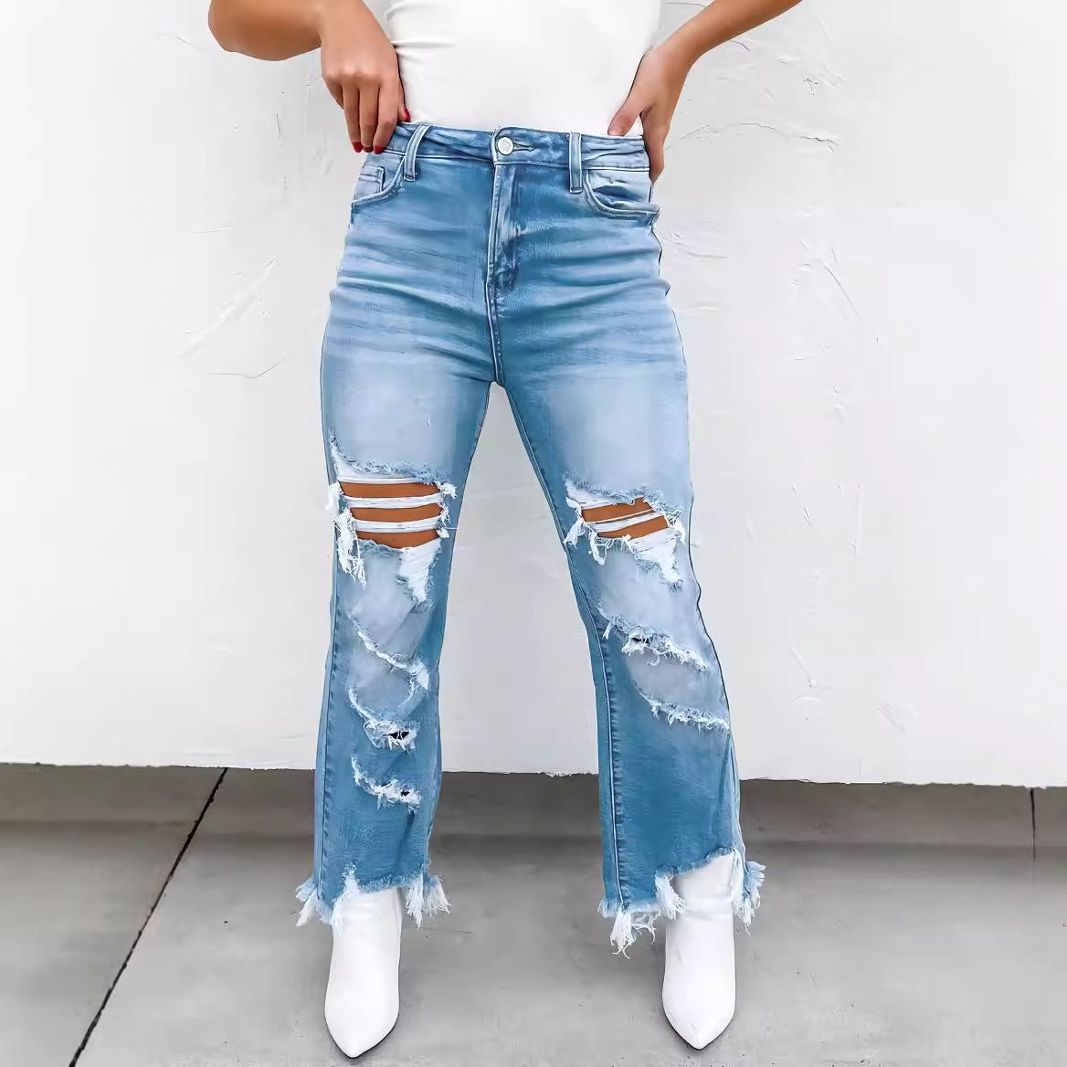 Women's High-Waisted Flared Jeans with Distressed Details