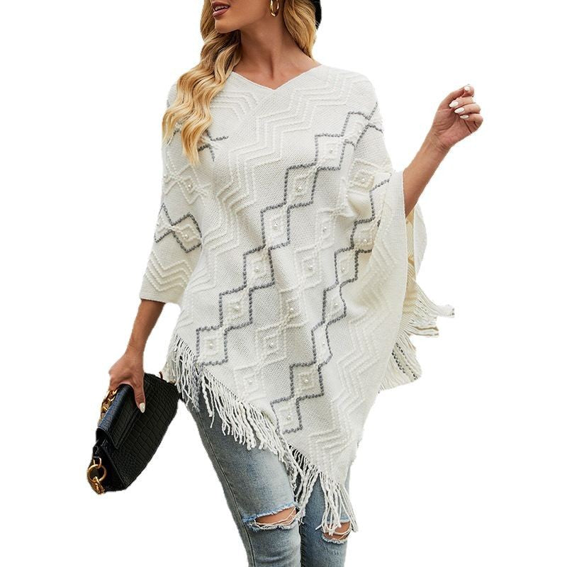 Women's Elegant Poncho with Textured Pattern and Decorative Fringe