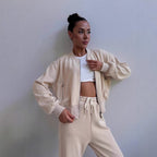 Women’s loungewear set with short zip jacket and high-waisted jogging pants with side split