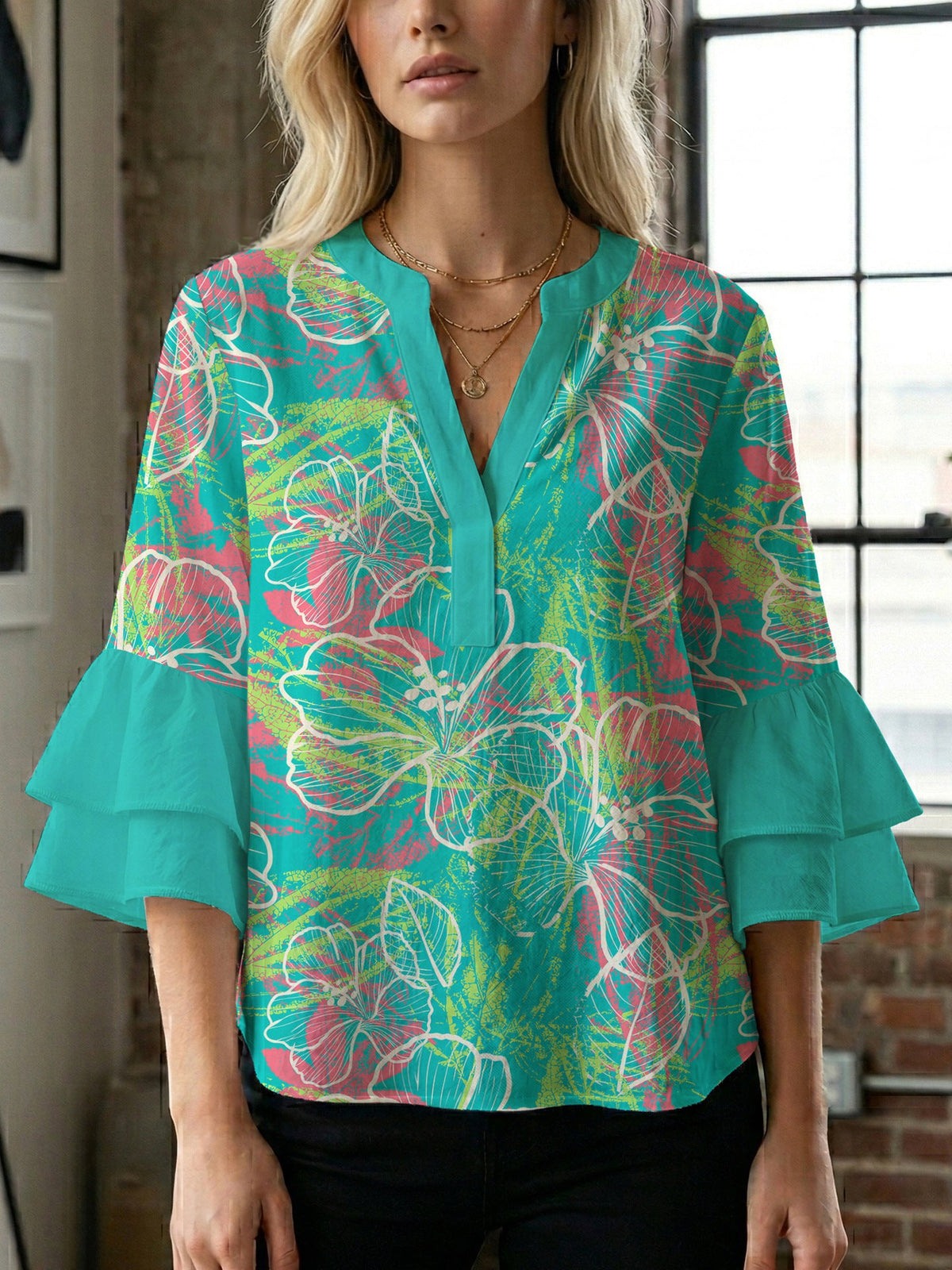 Women's Blouse with Voluminous Sleeves and Floral Design