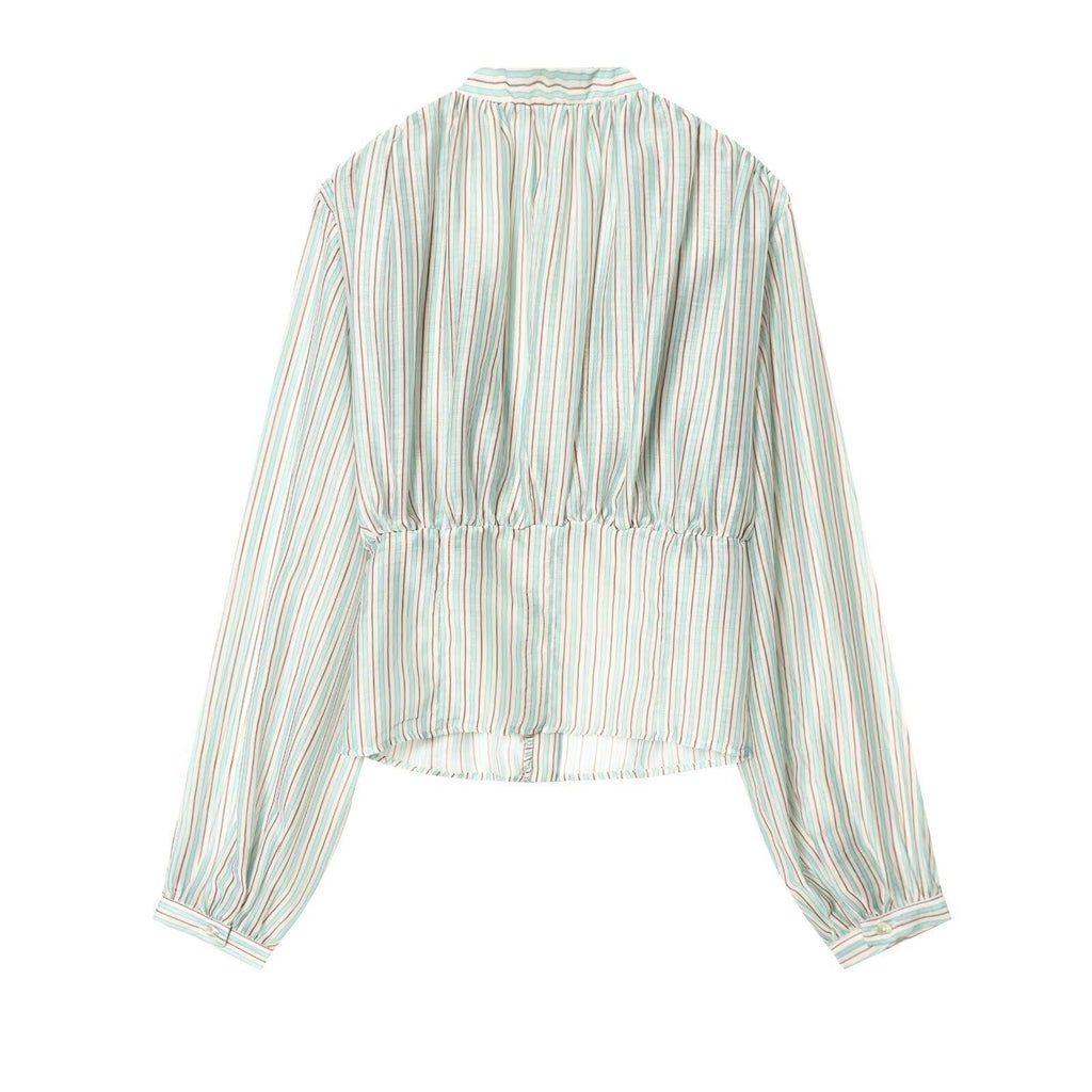 Women's Blouse with Deep V-Neck and Ruffle Details