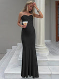 Elegant Evening Dress with Sophisticated Cut-Out and Flowing Hem