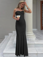 Elegant Evening Dress with Sophisticated Cut-Out and Flowing Hem