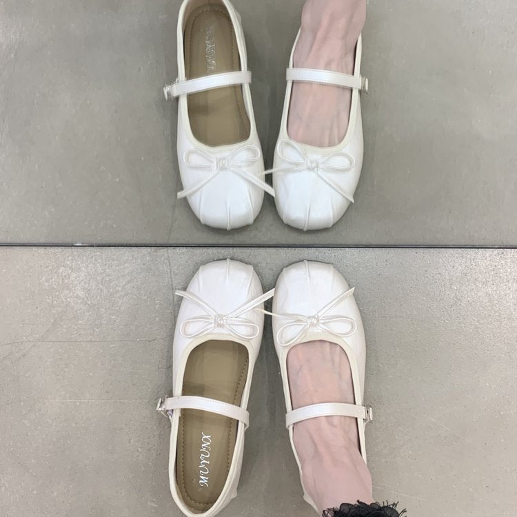 Women's ballet flats with decorative strap and comfortable footbed