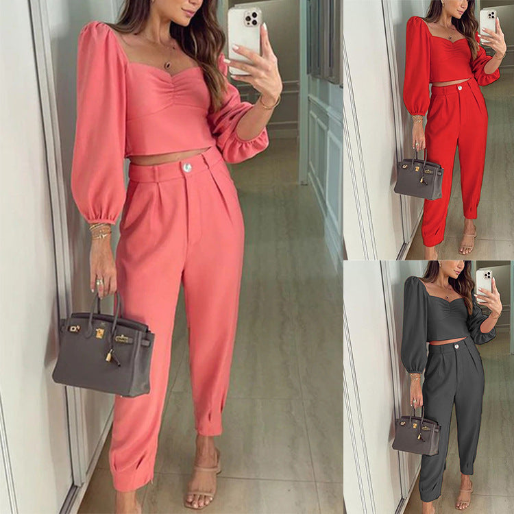 Elegant Women's Cropped Top and High-Waisted Trousers Set